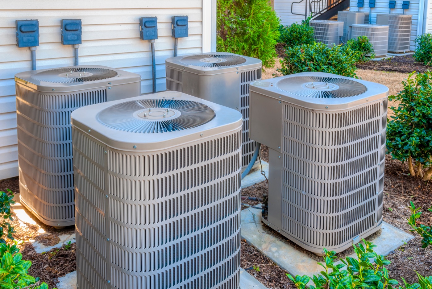 Outdoor air conditioning condensers at a residential building